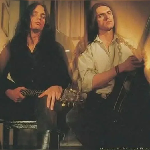 Kenny Hickey and Peter Steele sitting together with guitars