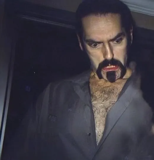 Peter Steele with his vampire goatee look in open shirt